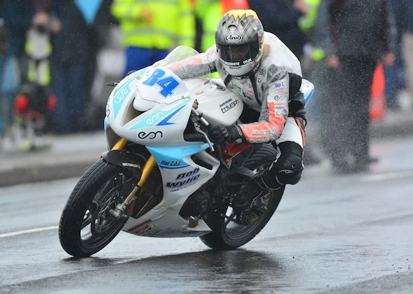 maria onboard the bob wylie triumph 675r at a wet nw200 by gavan caldwell